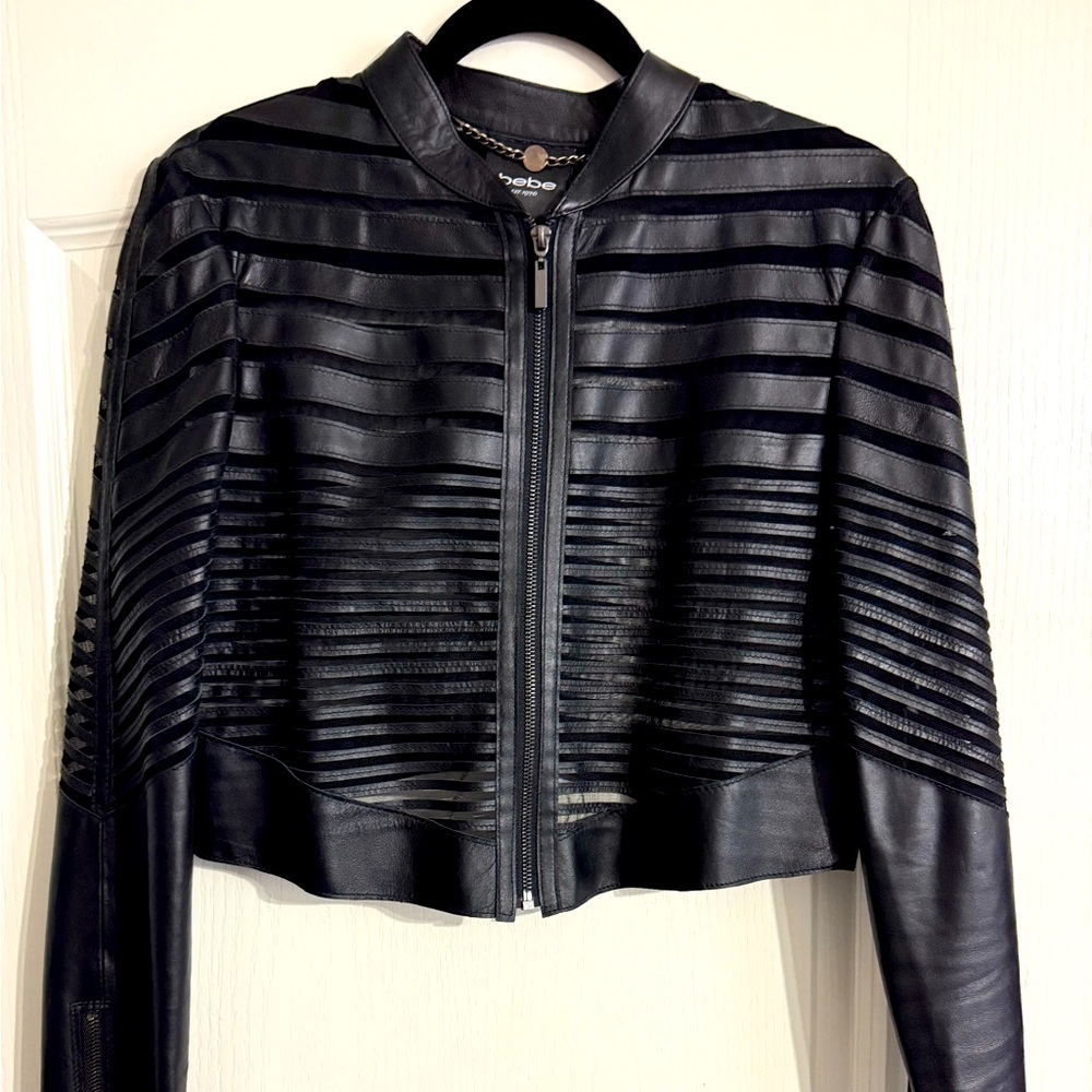 Bebe “Leather and Lace” style cropped jacket in black